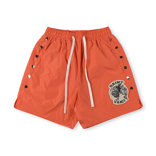 SAINT VANITY Graphic Side-Snap Nylon Shorts - Orange Hover Image